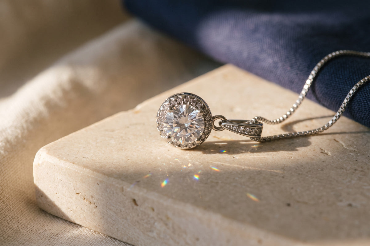 Halo pendant with a round cubic zirconia catching sunlight