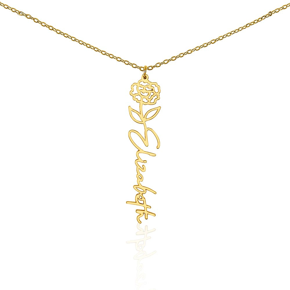 Gold-tone birth flower necklace with a carnation motif and vertical script name pendant on white.