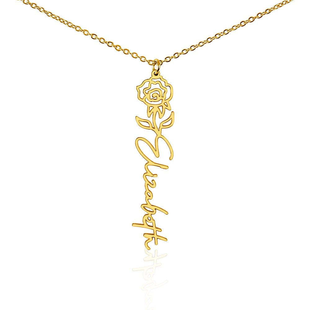 Gold-tone birth flower necklace with a rose motif and vertical script name pendant on white.