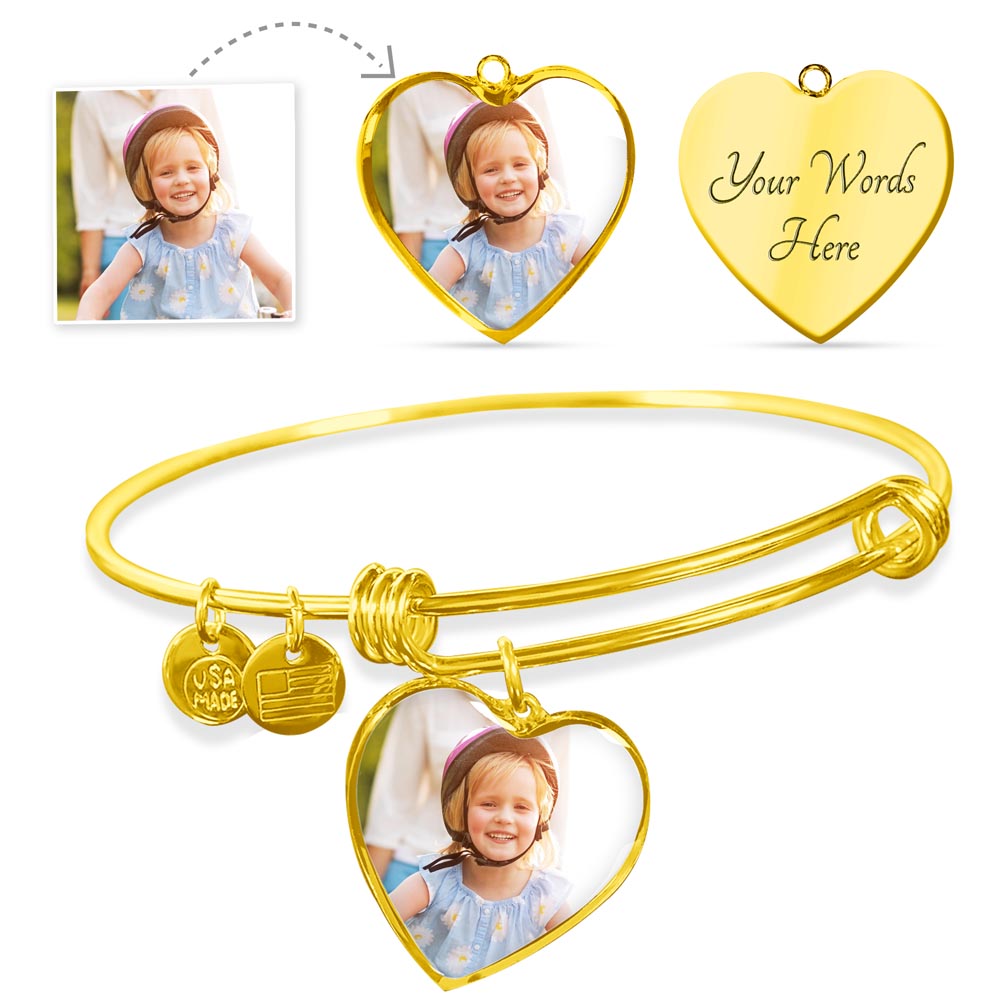 Gold-tone heart photo bangle with example photo and reverse engraving views.