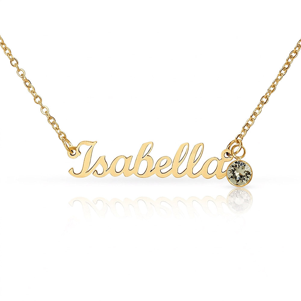 Gold-tone Isabella script name necklace with a clear birthstone accent on white.