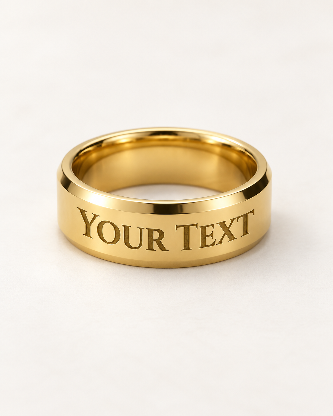 Gold-tone men's engraved ring with a sample Your Text message on the outer band.