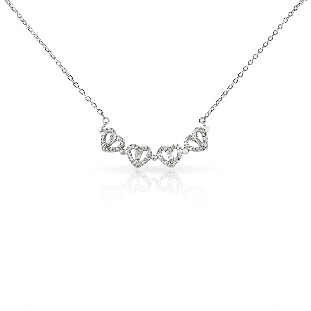 Magnetic hearts necklace opened into a row of four crystal-accented hearts.