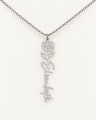 Silver-tone birth flower necklace with a carnation motif and vertical script name pendant on ivory.