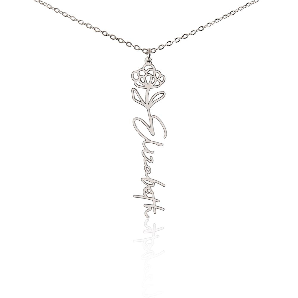 Silver-tone birth flower necklace with a chrysanthemum motif and vertical script name pendant on white.