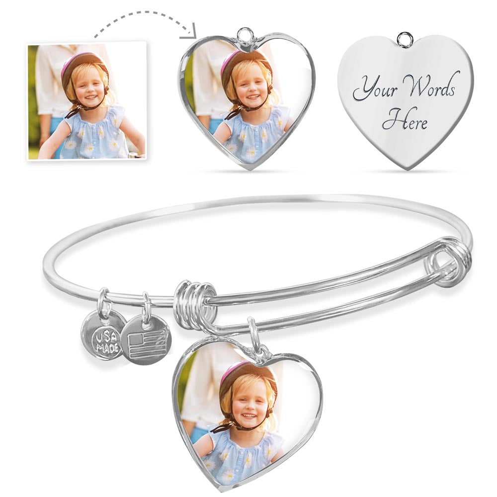 Silver-tone heart photo bangle with example photo and reverse engraving views.