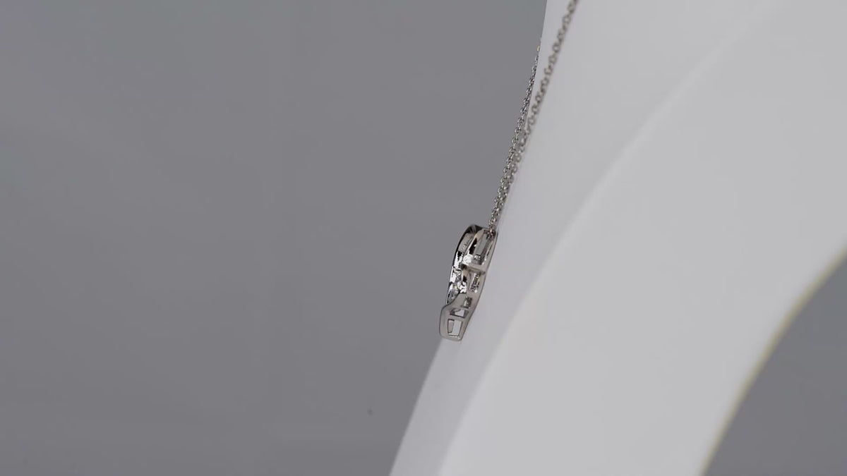 Product video showing the silver-tone classic heart CZ necklace.